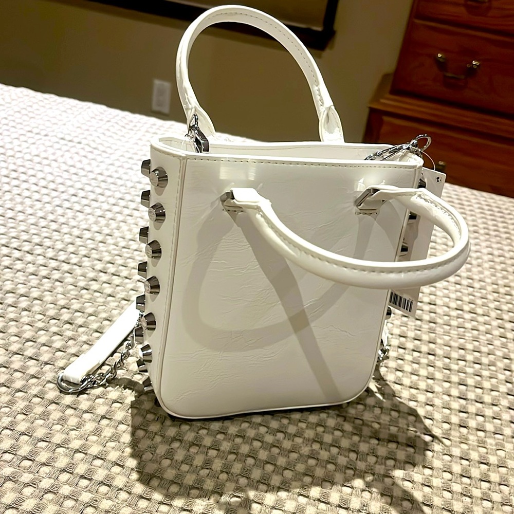 Urban Outfitters white studded mini bag.